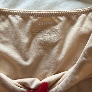 SKIMS Seamless Bodysuit - Light Nude